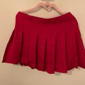 Red pleaded skirt